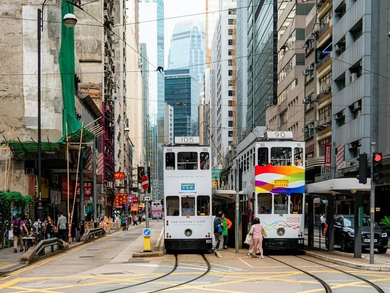 Double-decker trams on a Central street in Hong Kong